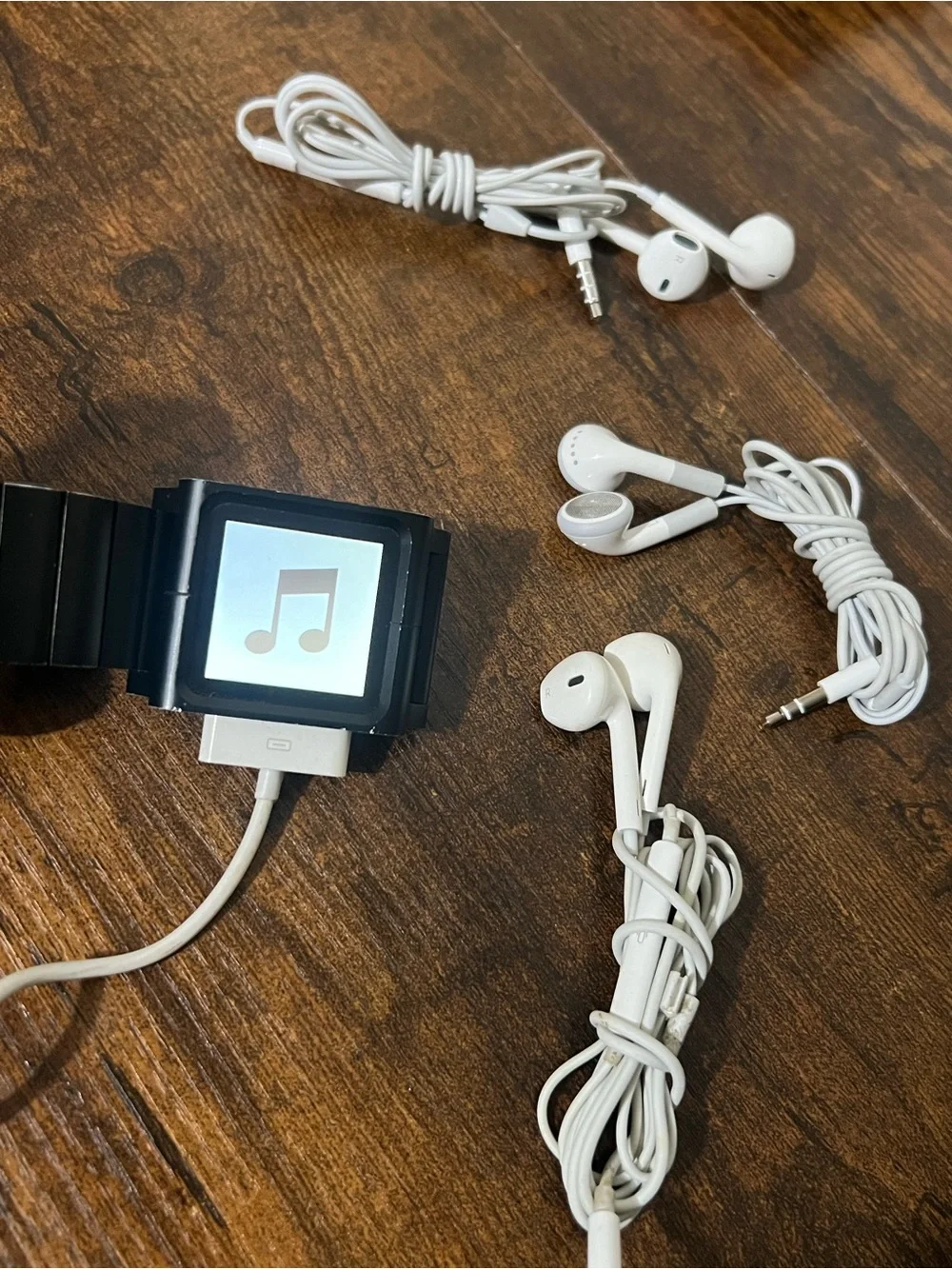 Apple Black iPod Nano with White Earbuds